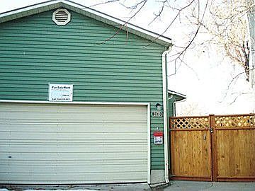 Front Curb/Driveway View (Is MUCH bigger INside than neighbors!)