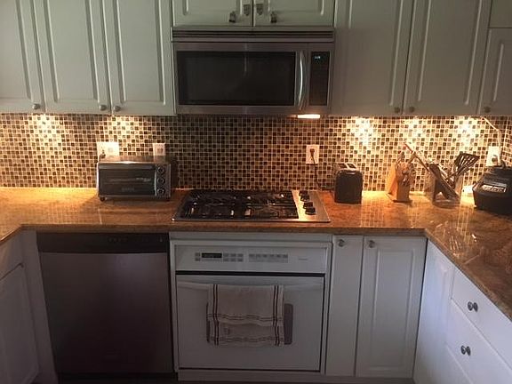Granite countertops, undermount cabinet lighting,