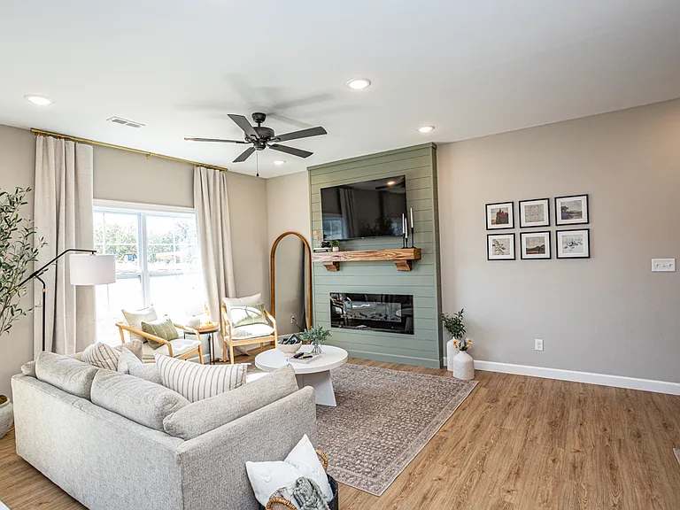 Living room complete with electric fireplace
