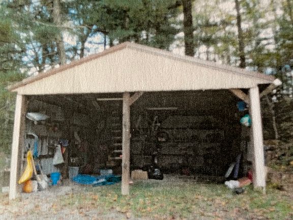 Unfinished pole garage