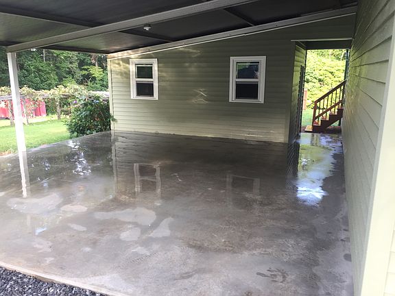 Carport and hobby rooms
