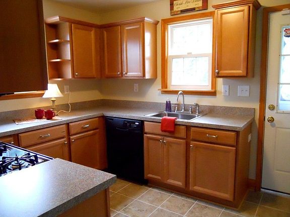Sunny Kitchen with new Maple Cabinets