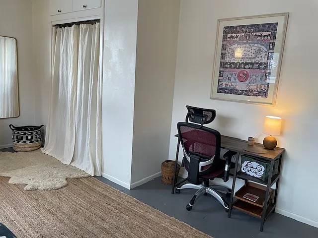 Desk and closet in second bedroom
