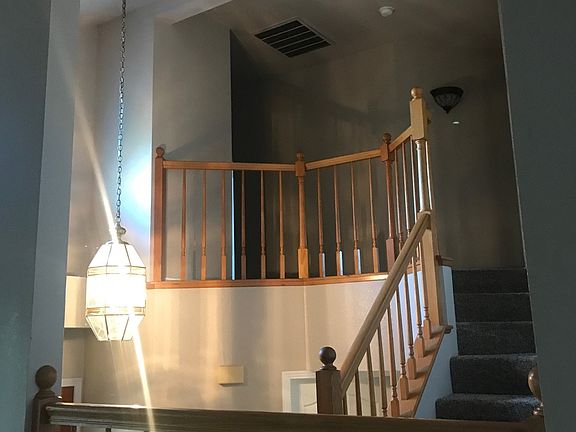 Top of stairs in entry