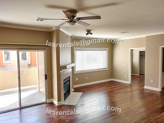 Living Area. Brand New Floors and Designer Paint. New Ceiling Fans