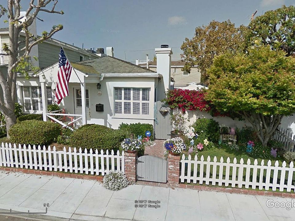 Front of House and gate to Side yard