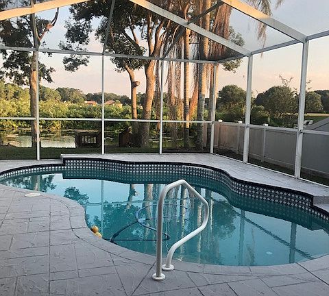 Pool, deck, lake view