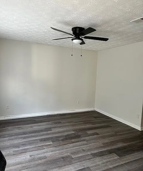 Great room new LPV flooring and fresh gray paint