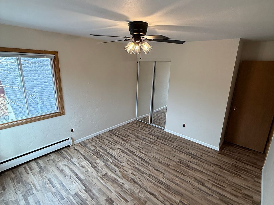 Bedroom #1, New flooring, paint, ceiling fan