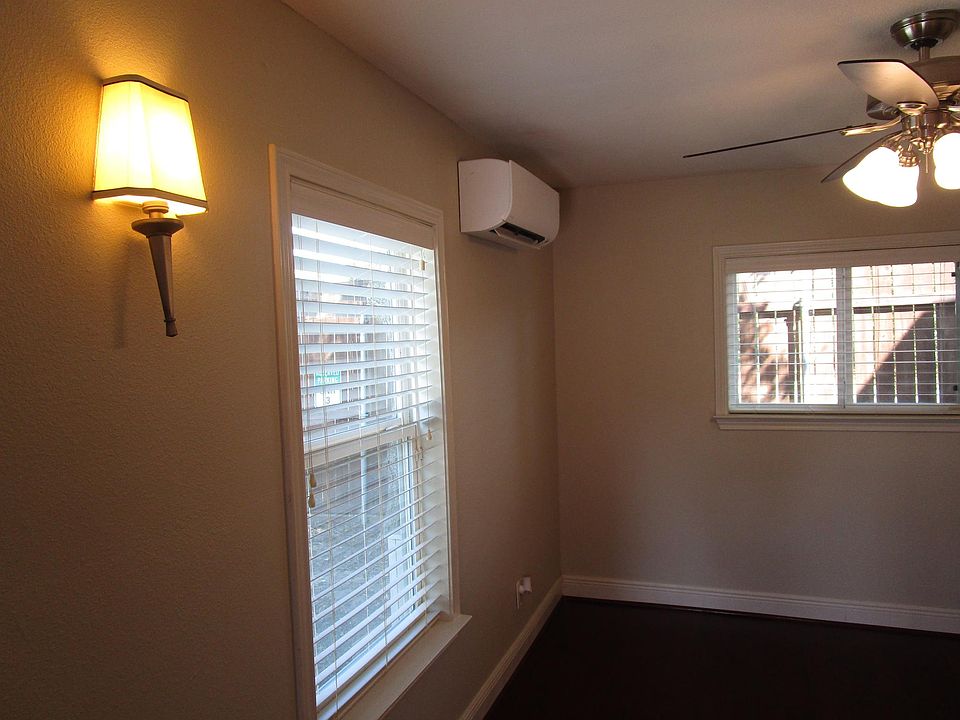 9000 BTU mini-split. Very quiet you cannot even hear it. Plenty light thru windows.