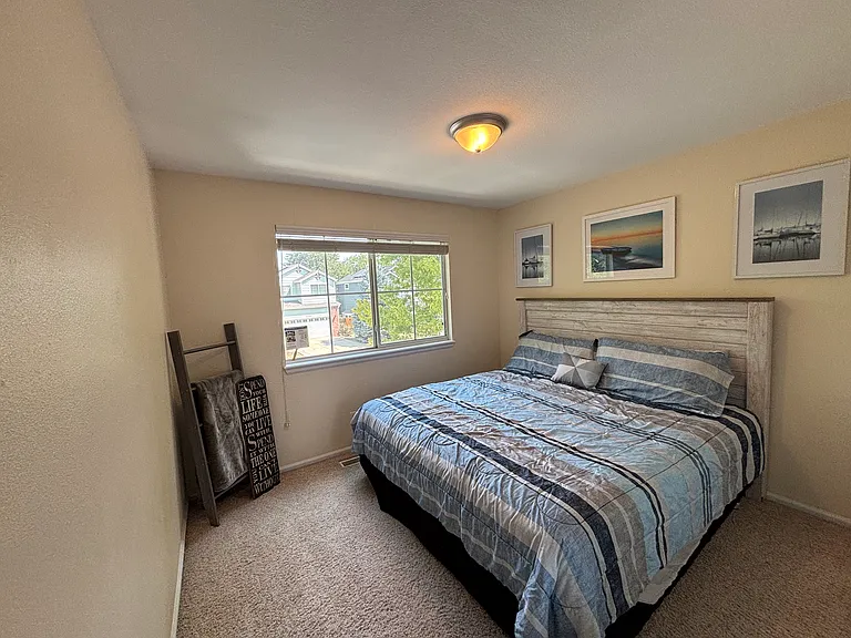 Second room upstairs. Large window lets in plenty of sun.