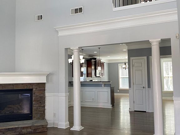 Open living room with gas fireplace