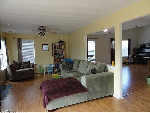 Den with view into Spacious Living Room. Previous listing photo