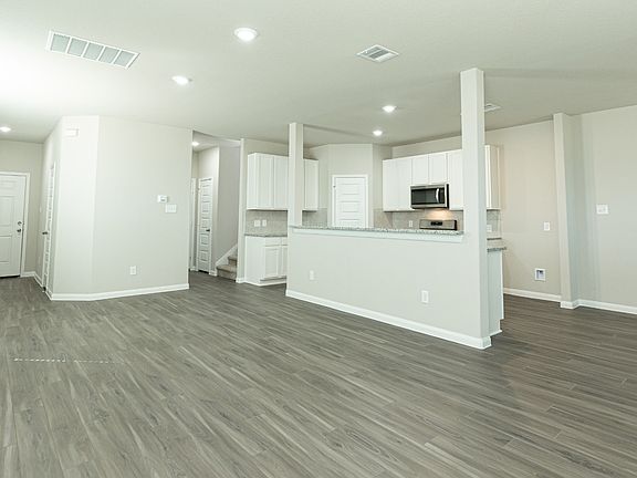 Family Room to Kitchen and Dining Area
