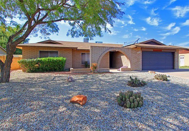 This well-constructed slump-block home sits in a nice Tempe neighborhood!