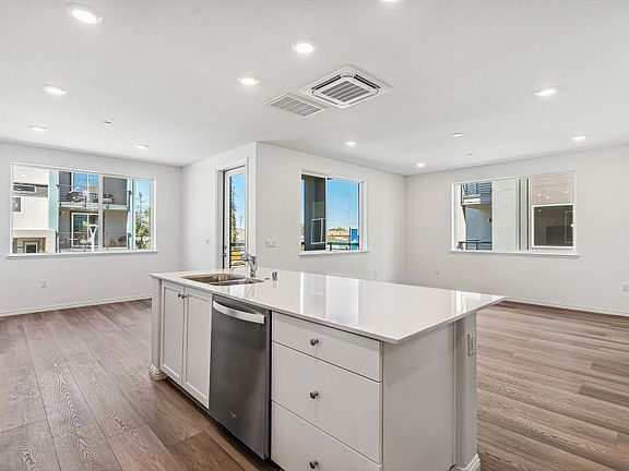 Kitchen open to gathering room and cafe