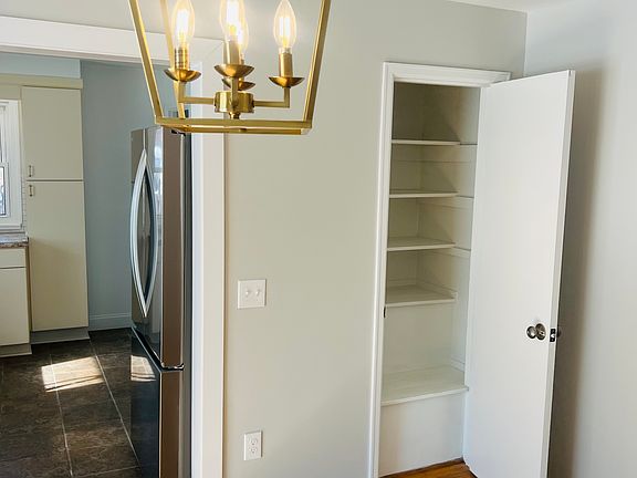 Dining room with large pantry space