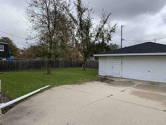 Backyard and two-car garage