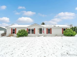 6169 Maple Hill Rd, Howard City, MI 49329