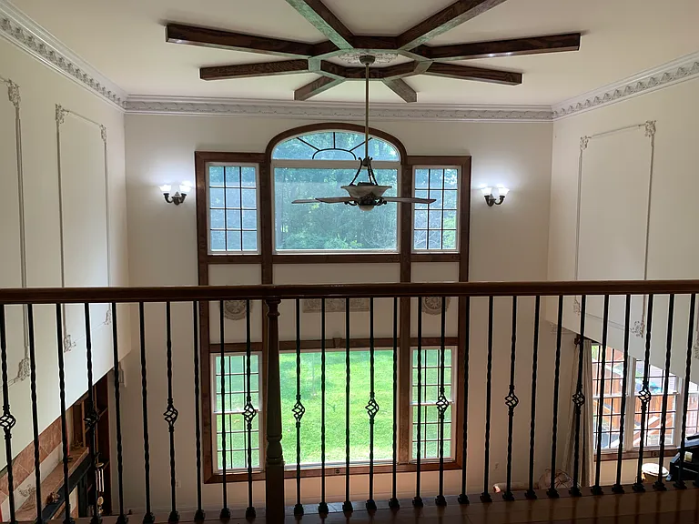overlooking family room and backyard