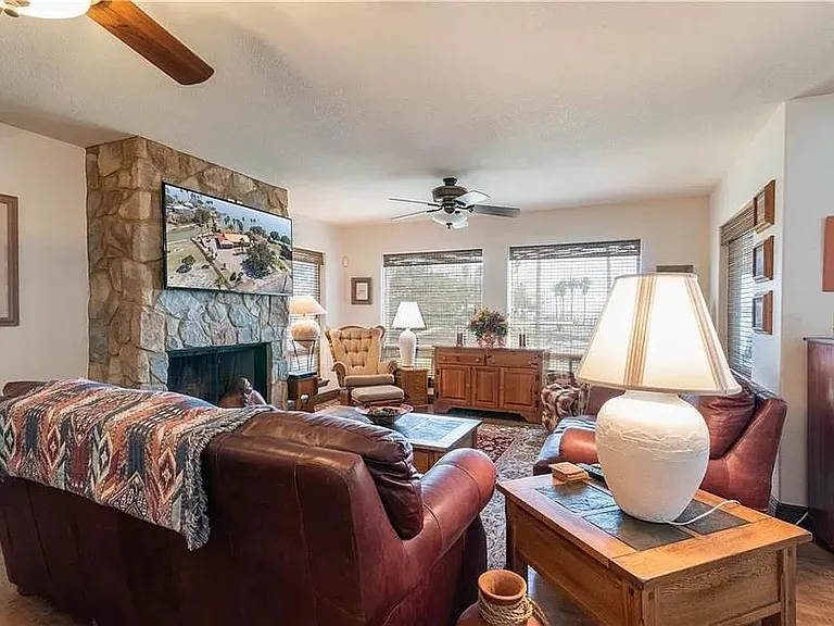 First floor family / recreational area with wood-burning fireplace. Great for watching the big game with friends and family.
