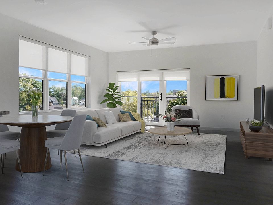 Large Living Areas with Wood Style Flooring, Ceiling Fans, and Lots of Natural Lighting