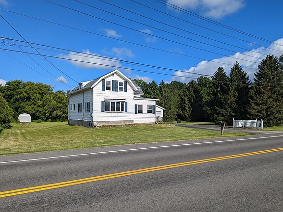 Side yard with large backyard shed