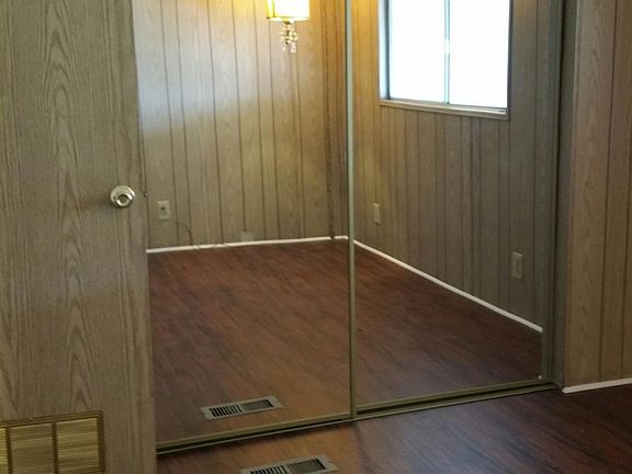 Second bedroom with new mirror closets