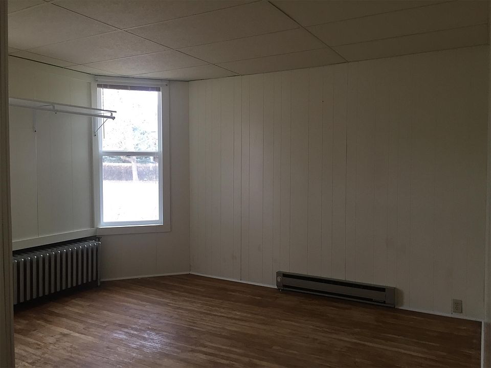 Large Bedroom with large windows for light.