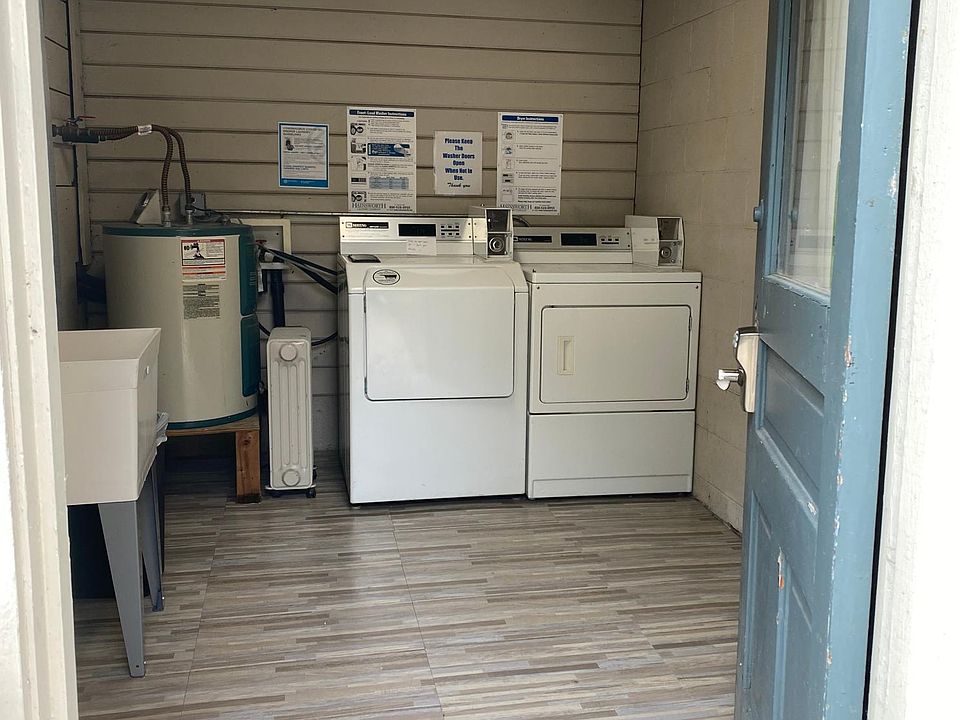 Shared Coin- operated laundry room.