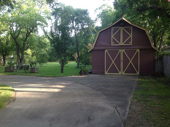 Back yard view with barn