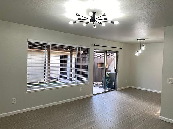 Living Room, to Dining and Patio