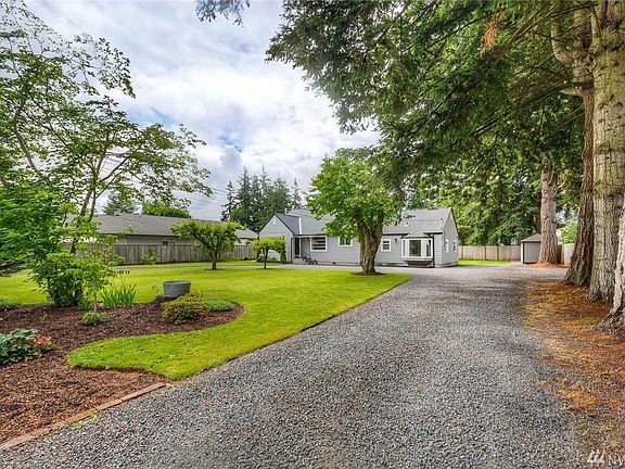 Fully fenced, private lot on 1/3 park like acre, fruit trees