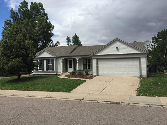 Home is on quiet street with great yard, deck, large garage and off street parking