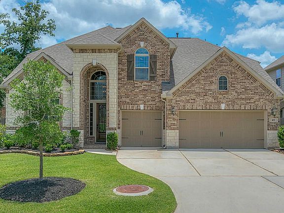 A three car garage awaits you! Have one side for the car of your dreams with the remaining two for every day.