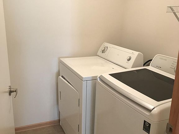 Laundry room right off the kitchen. 