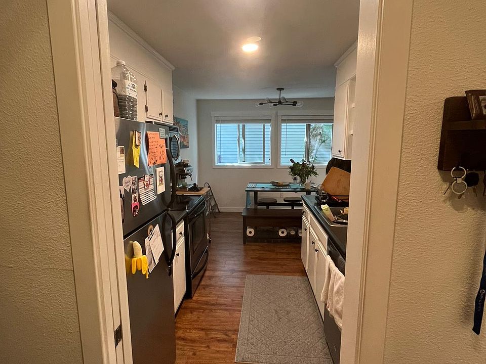 Walking from main entrance into kitchen
