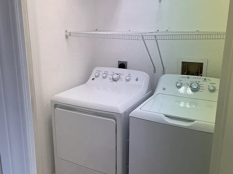 Washer and dryer in house.