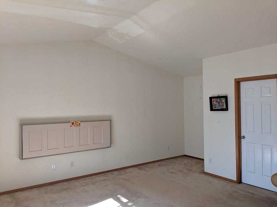 The Master bedroom with its private bathroom. Huge enough for a king size bed, a fainting couch, a desk, and high dresser. The perfect hideaway for parents with children, as well as the ideal sanctuary for a quiet evening .Note that we removed the headb