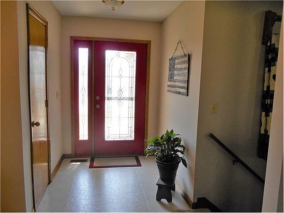 Nice Entry with a coat closet