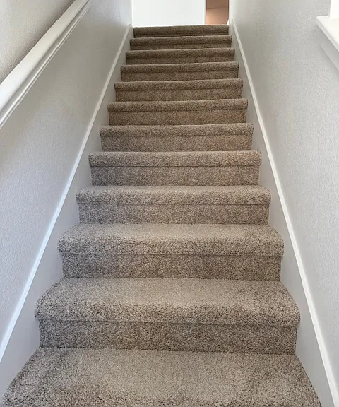 Stairs to second floor from great room