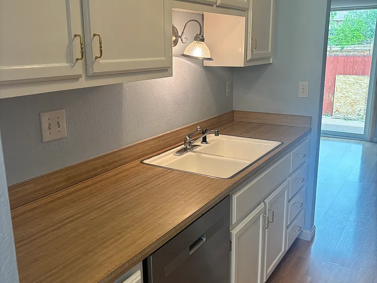 Stainless steel dishwasher and abundance of storage