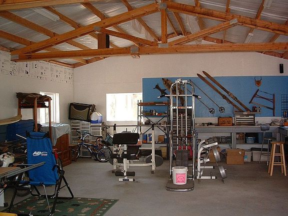 Large shop has built in bench and pegboards
