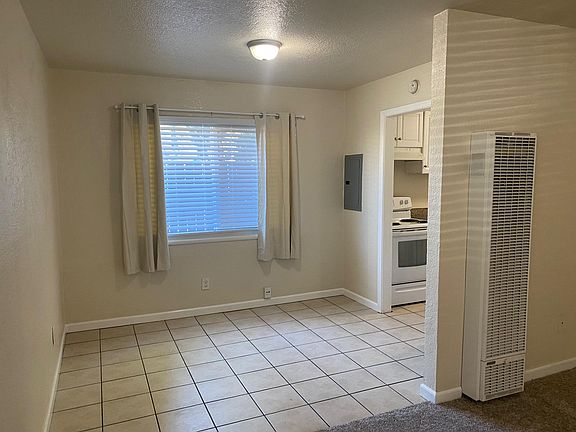 Dining area with tile floor.
