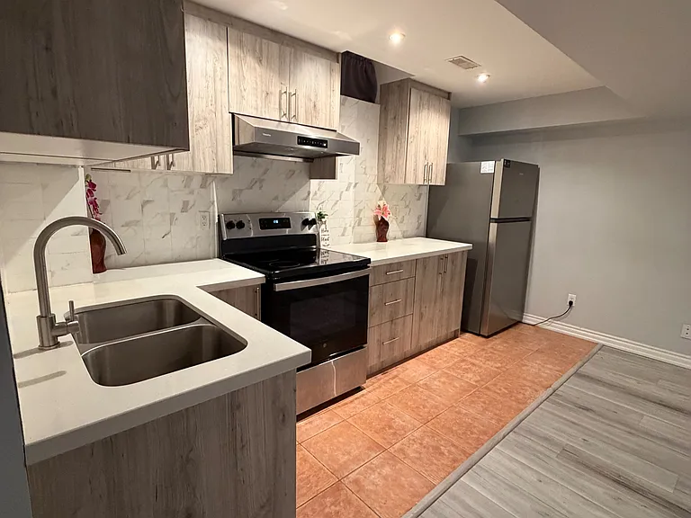51 Ralph Chalmers Ave #BASEMENT — Photo 9