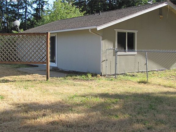 Want some privacy off your patio? There is a privacy fence already up. Let it shine to fit your own personality! Again, notice the fenced off back yard.
