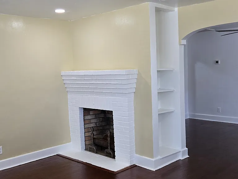 Fireplace and built in bookshelf