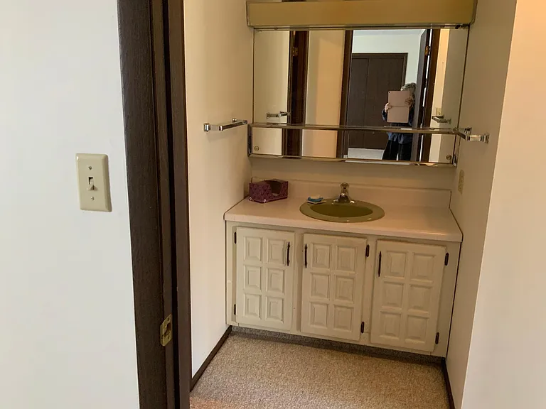 Vanity outside bathroom.