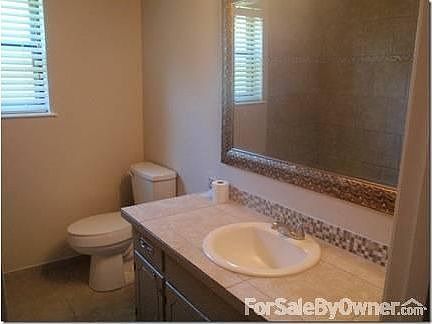 The second bathroom
						:
						Large second bathroom with all new tile and wonderful cast-iron tub