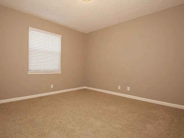 MINI BLINDS AND VERTICAL BLINDS INCLUDED AT LAUREL RIDGE APARTMENTS